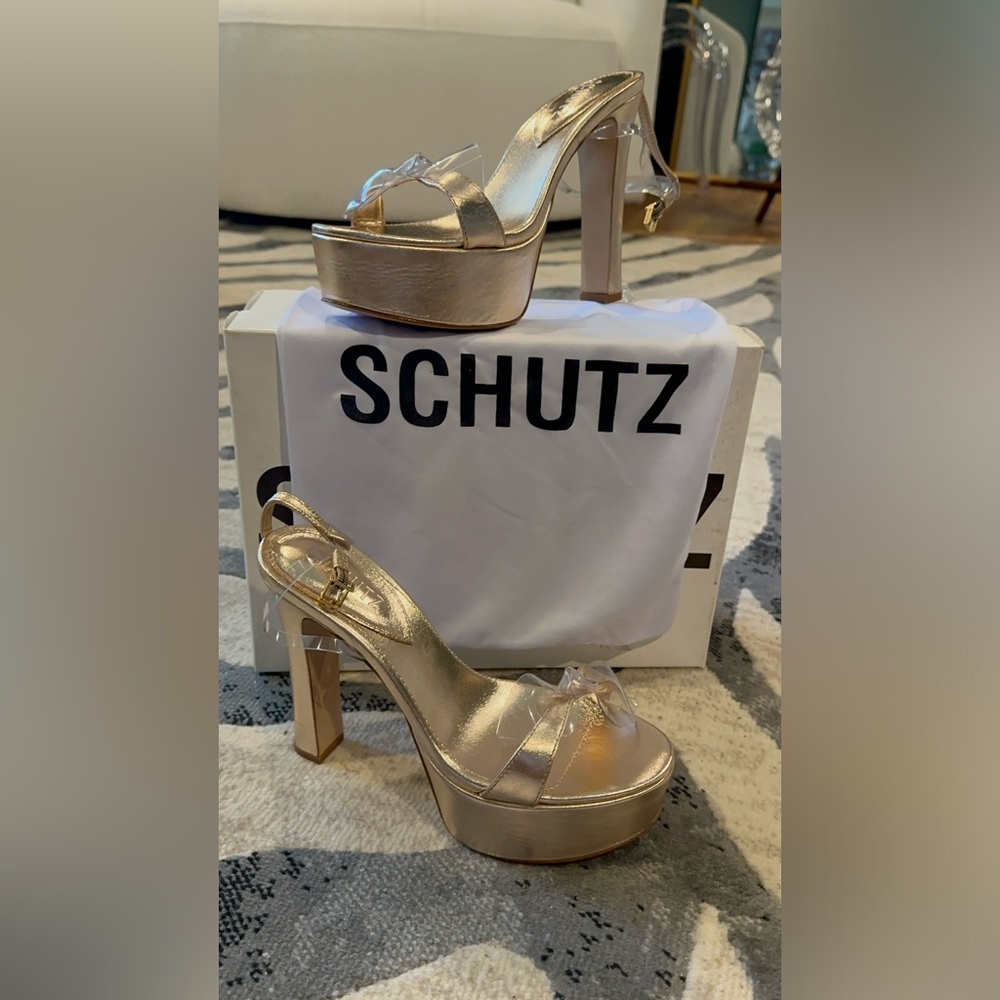 Schultz Gold and Clear Platform Heels